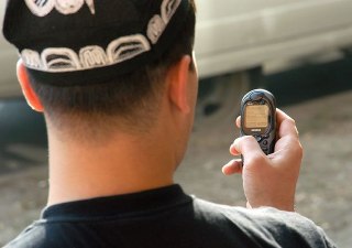Мигранты в России: Обязательная электронная идентификация на мобильных устройствах